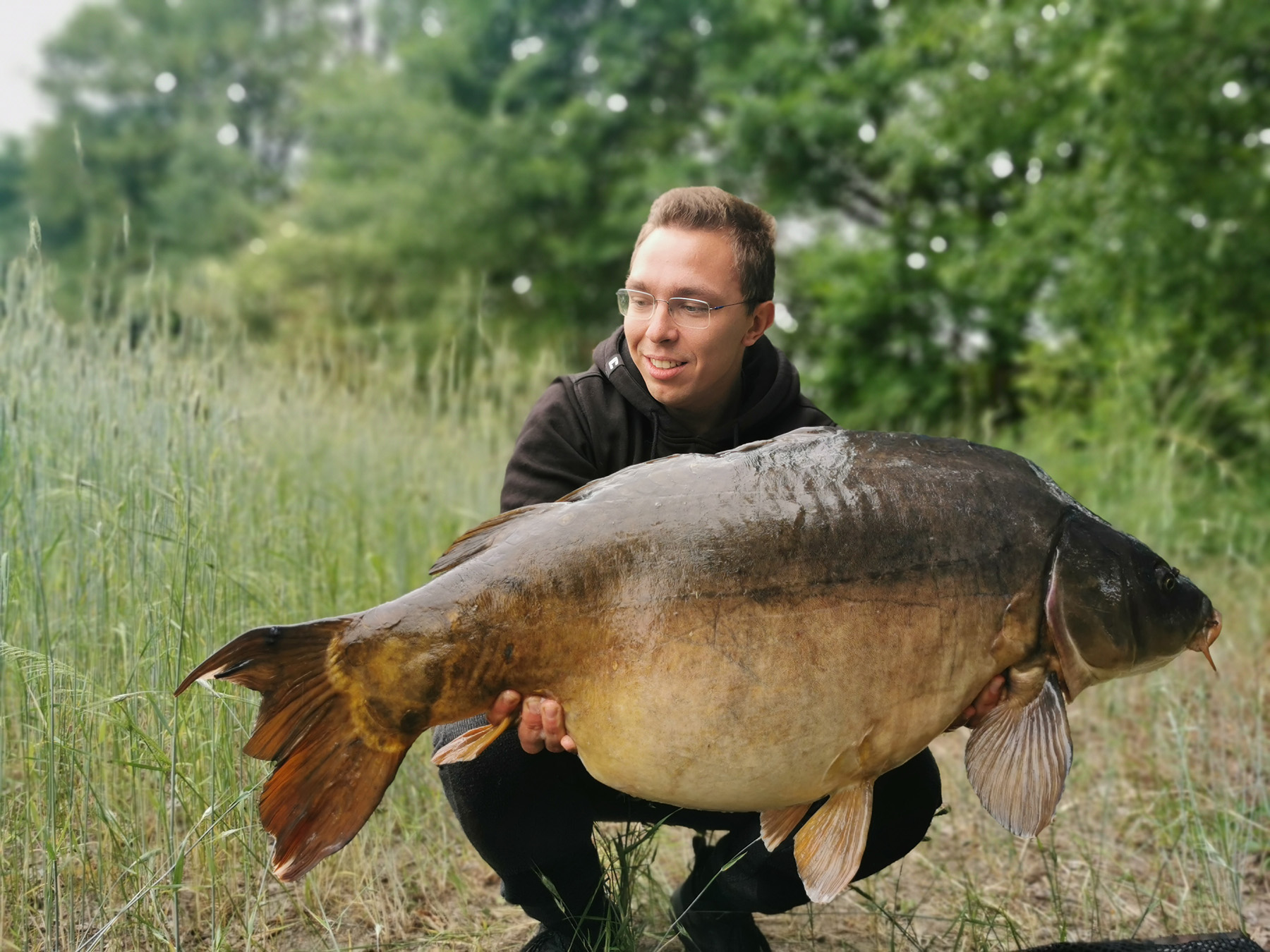Dustin Schulze fängt um die Laichzeit beim Karpfenangeln große Karpfen mit White Lightning Pop Ups von Naturebaits